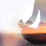 Double exposure of young woman silhouette practicing yoga